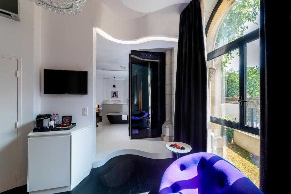 Télévision ou salle de divertissement dans l'établissement SOZO Hotel