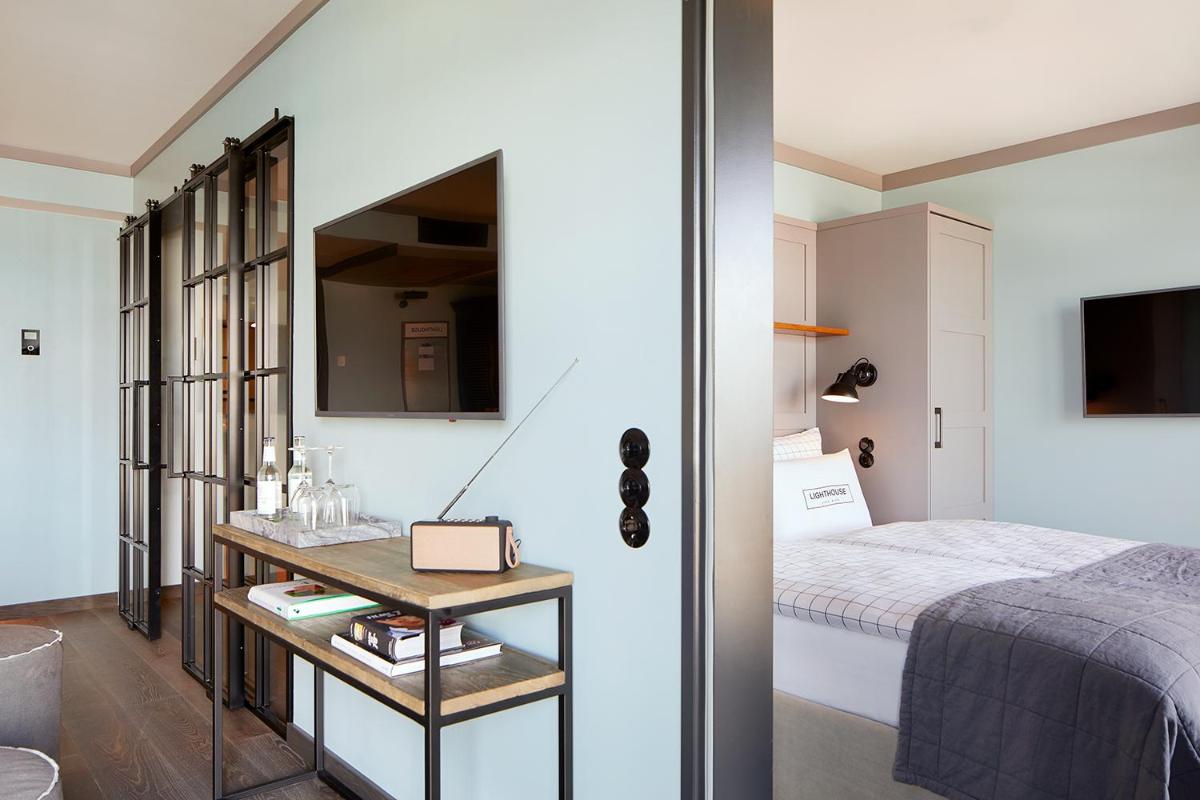 Ein Bett oder Betten in einem Zimmer der Unterkunft Lighthouse Hotel & Spa