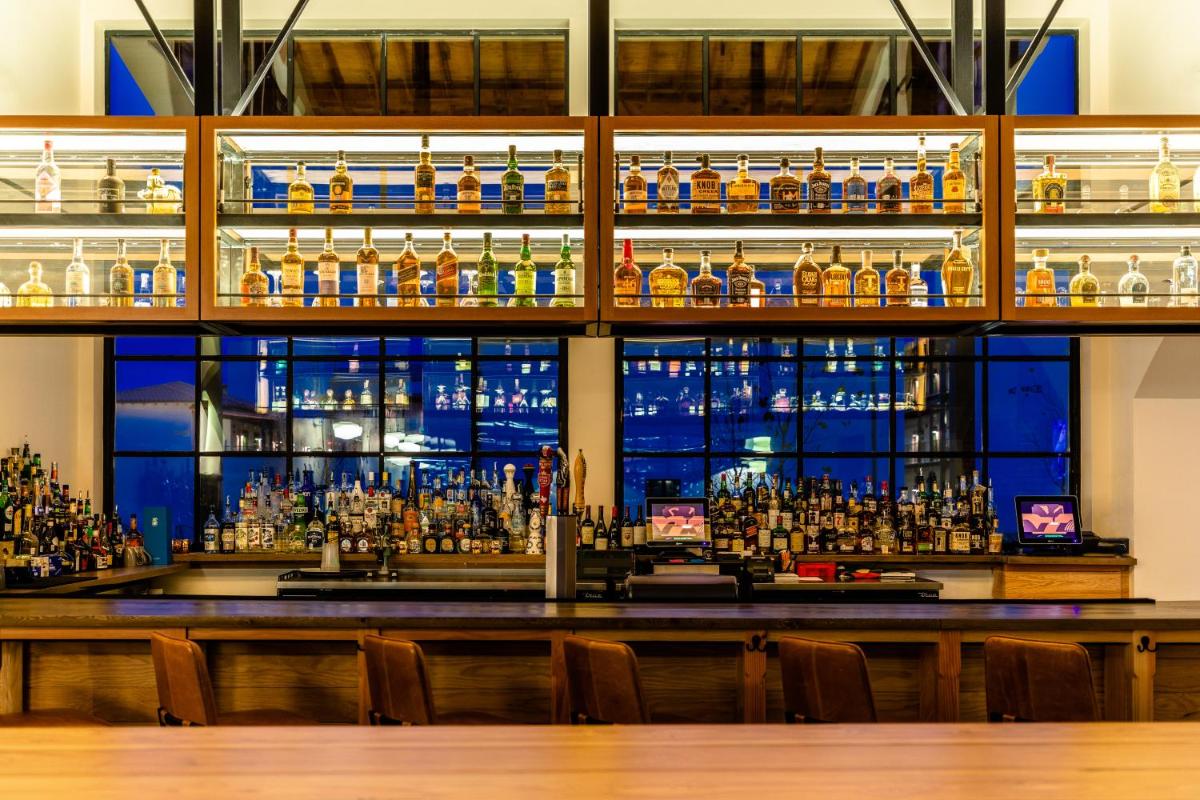 Texican Court, by Valencia Hotel Collection - Housity