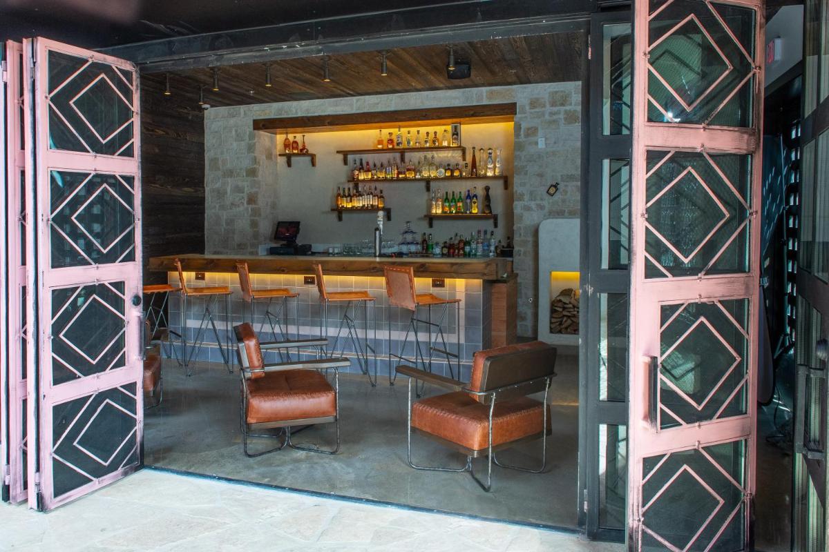 Texican Court, by Valencia Hotel Collection - Housity