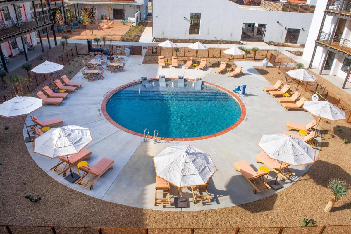 Texican Court, by Valencia Hotel Collection - Housity