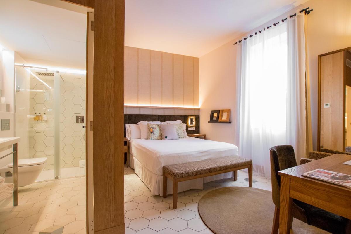 Cama o camas de una habitación en Boutique Hotel Sant Roc & Spa