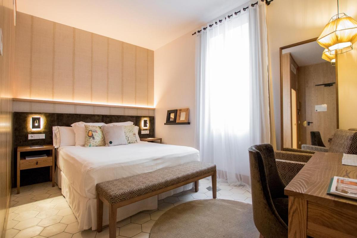 Cama o camas de una habitación en Boutique Hotel Sant Roc & Spa