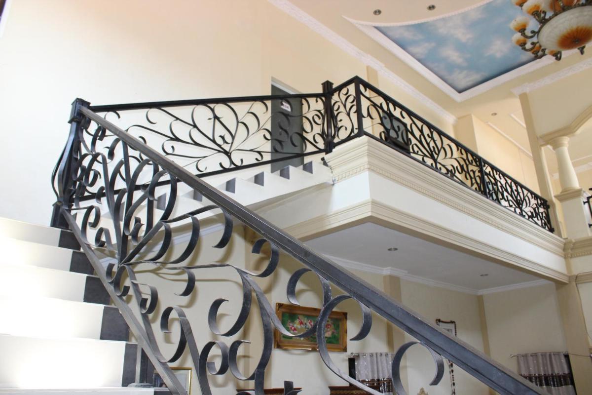 Angela Homestay Manado - Housity