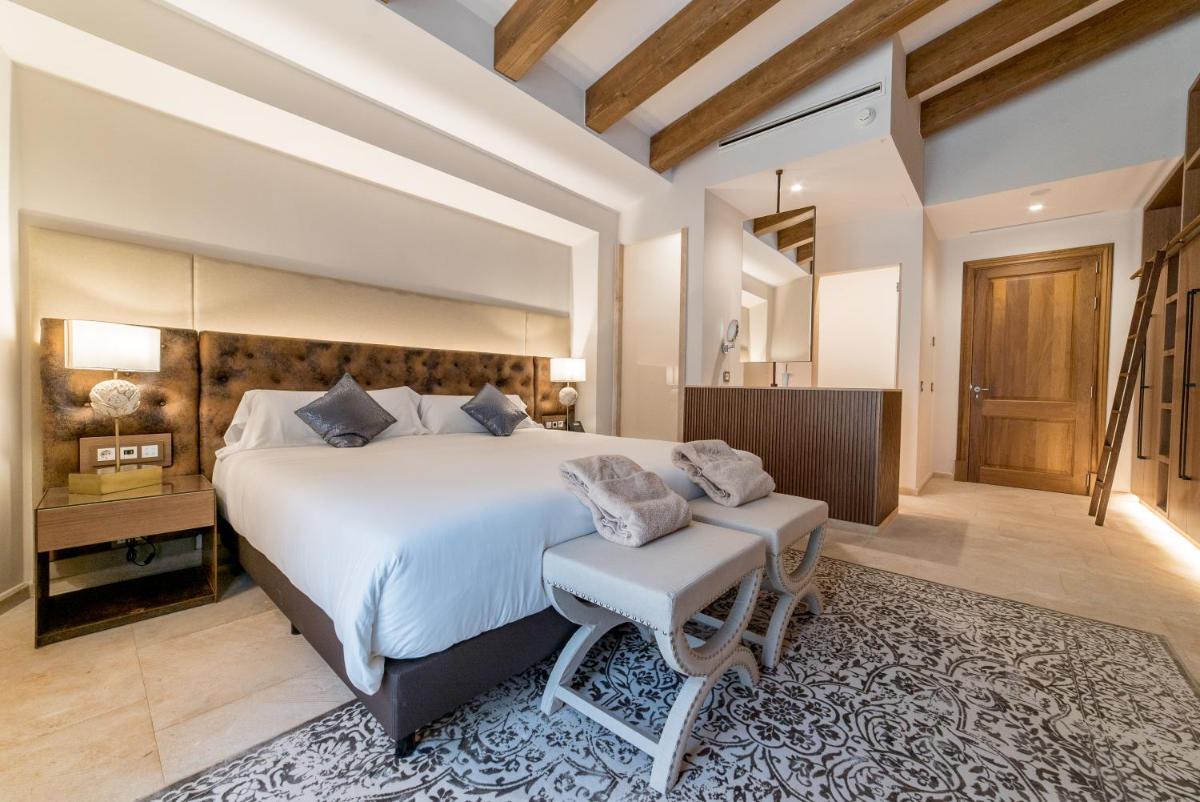 Cama o camas de una habitación en Hotel Creu de Tau Art&Spa-Adults only