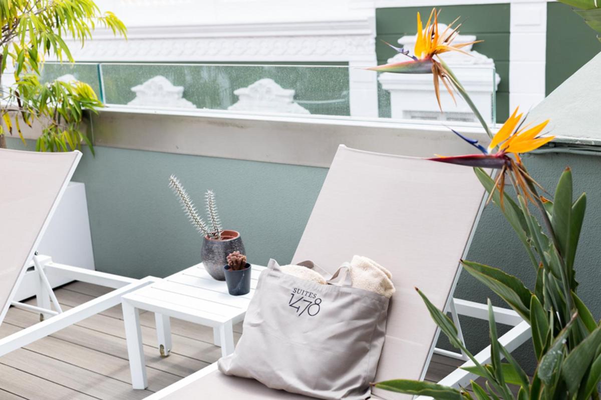 Un balcón o terraza de Suites 1478