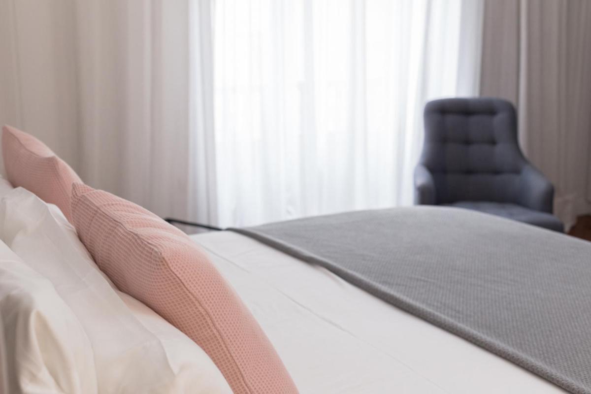 Cama o camas de una habitación en Suites 1478