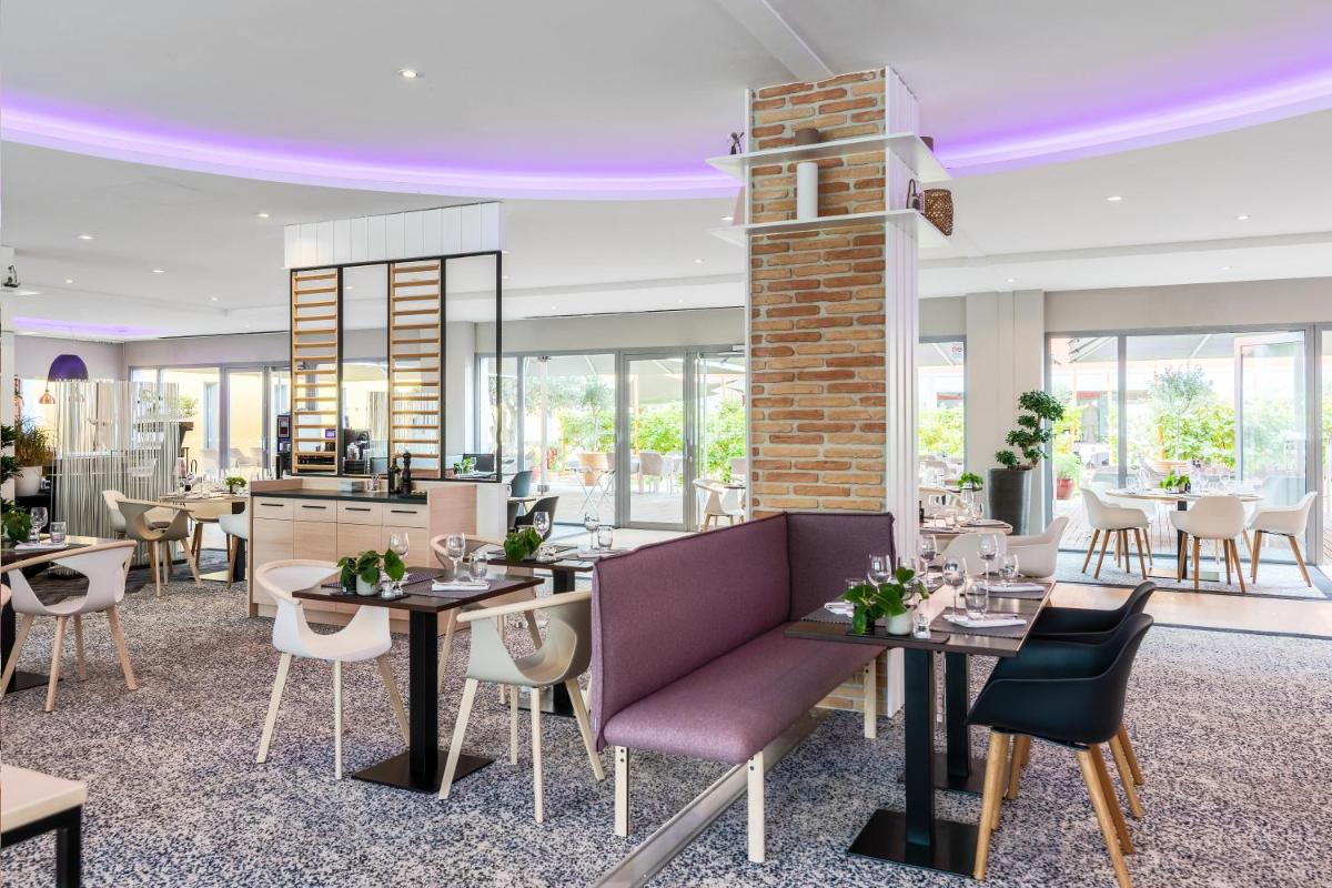Coin salon dans l'établissement Radisson Blu Hotel Toulouse Airport