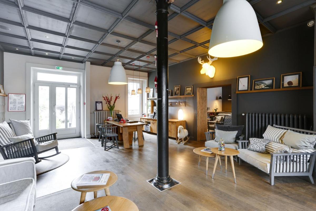 Coin salon dans l'établissement Le Faucigny - Hotel de Charme & SPA