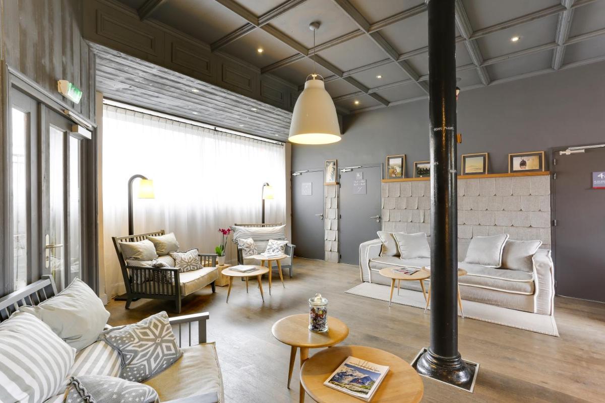 Coin salon dans l'établissement Le Faucigny - Hotel de Charme & SPA