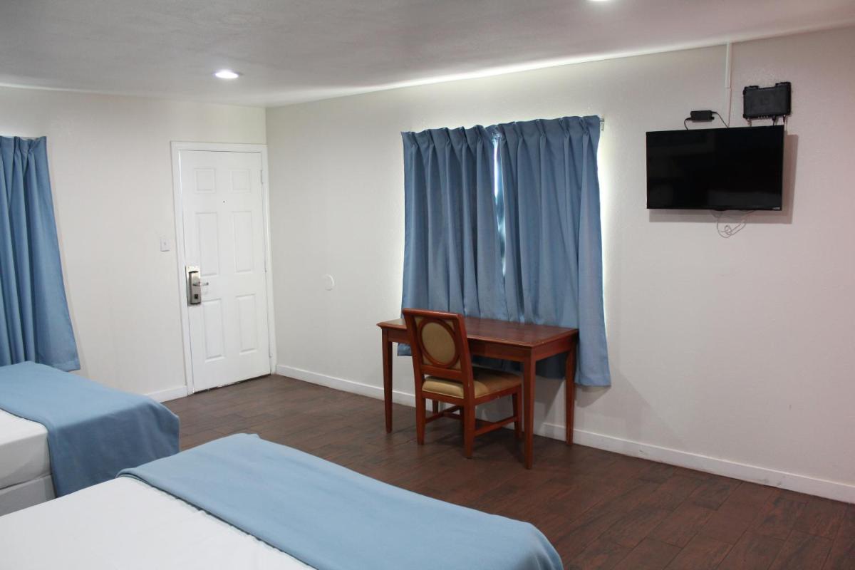 Oceanside Inn and Suites - Housity