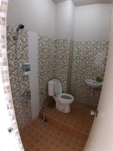 Tulip Inn Tomohon - Housity