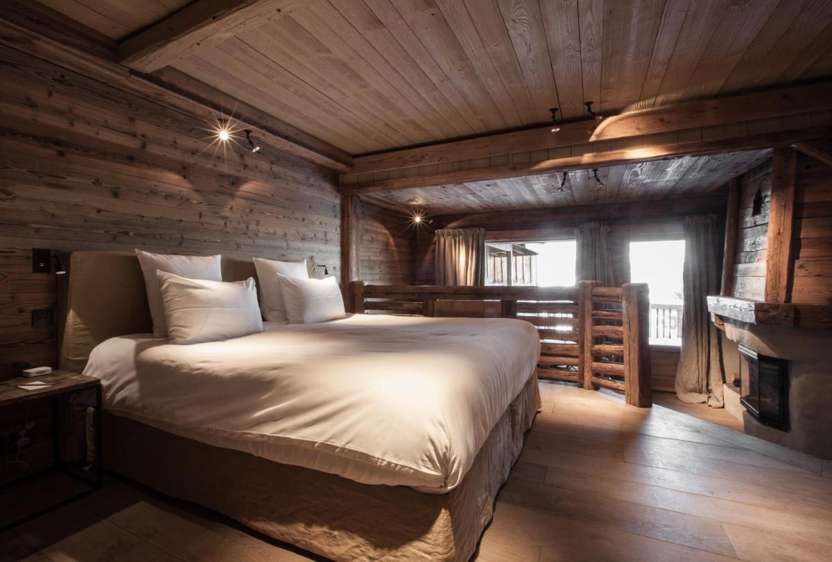 Un ou plusieurs lits dans un hébergement de l'établissement Zannier Le Chalet