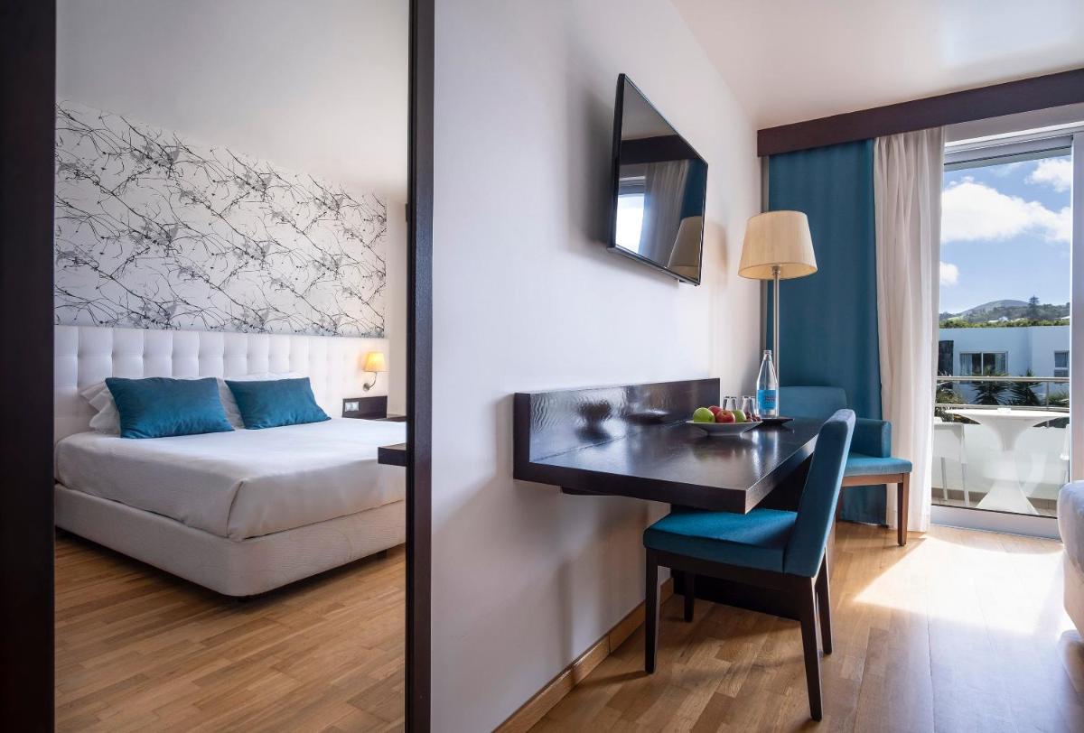 Uma cama ou camas num quarto em Hotel Vale Do Navio