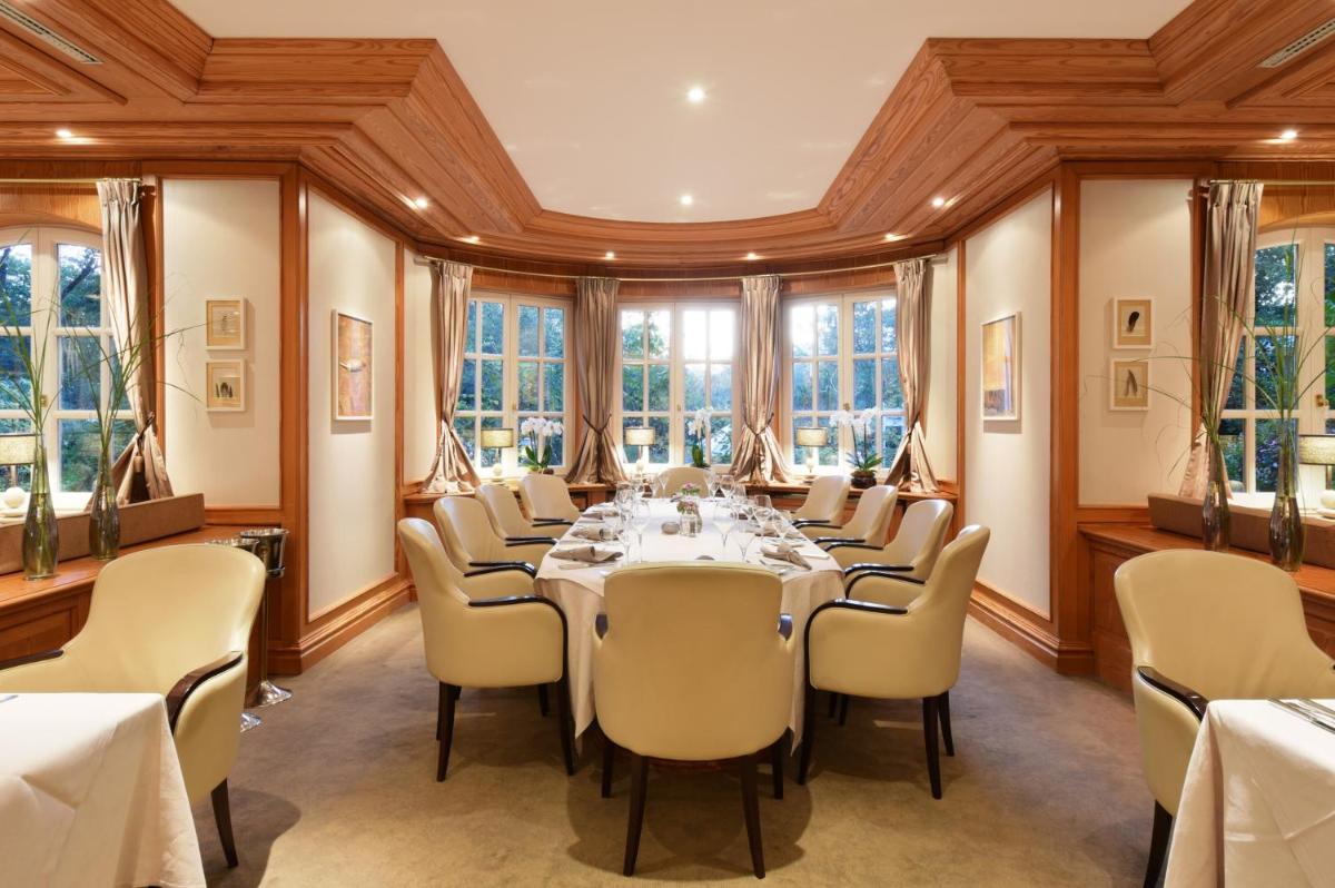 Ein Sitzbereich in der Unterkunft Hotel Landhaus Wachtelhof