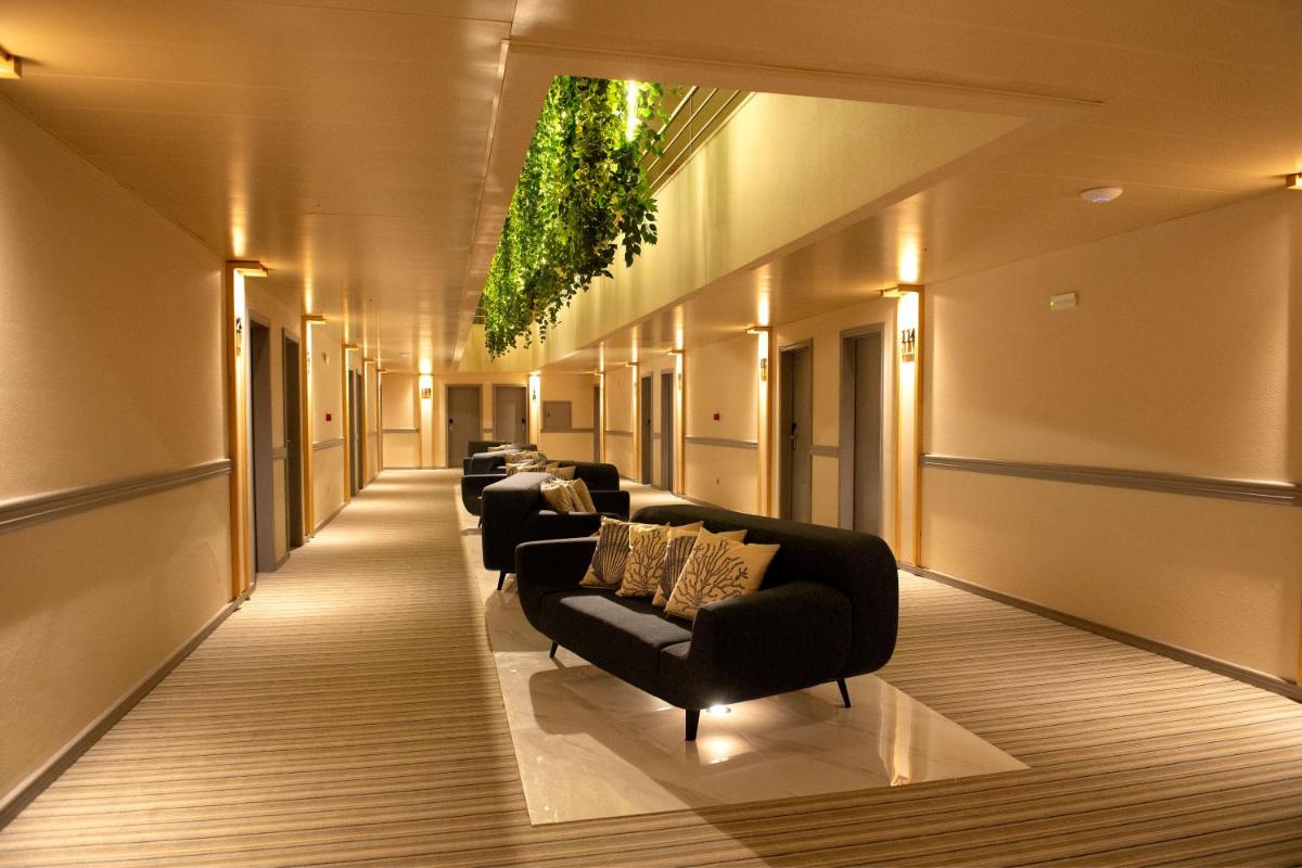 Uma área de estar em Hotel Cristal Vieira Praia & SPA