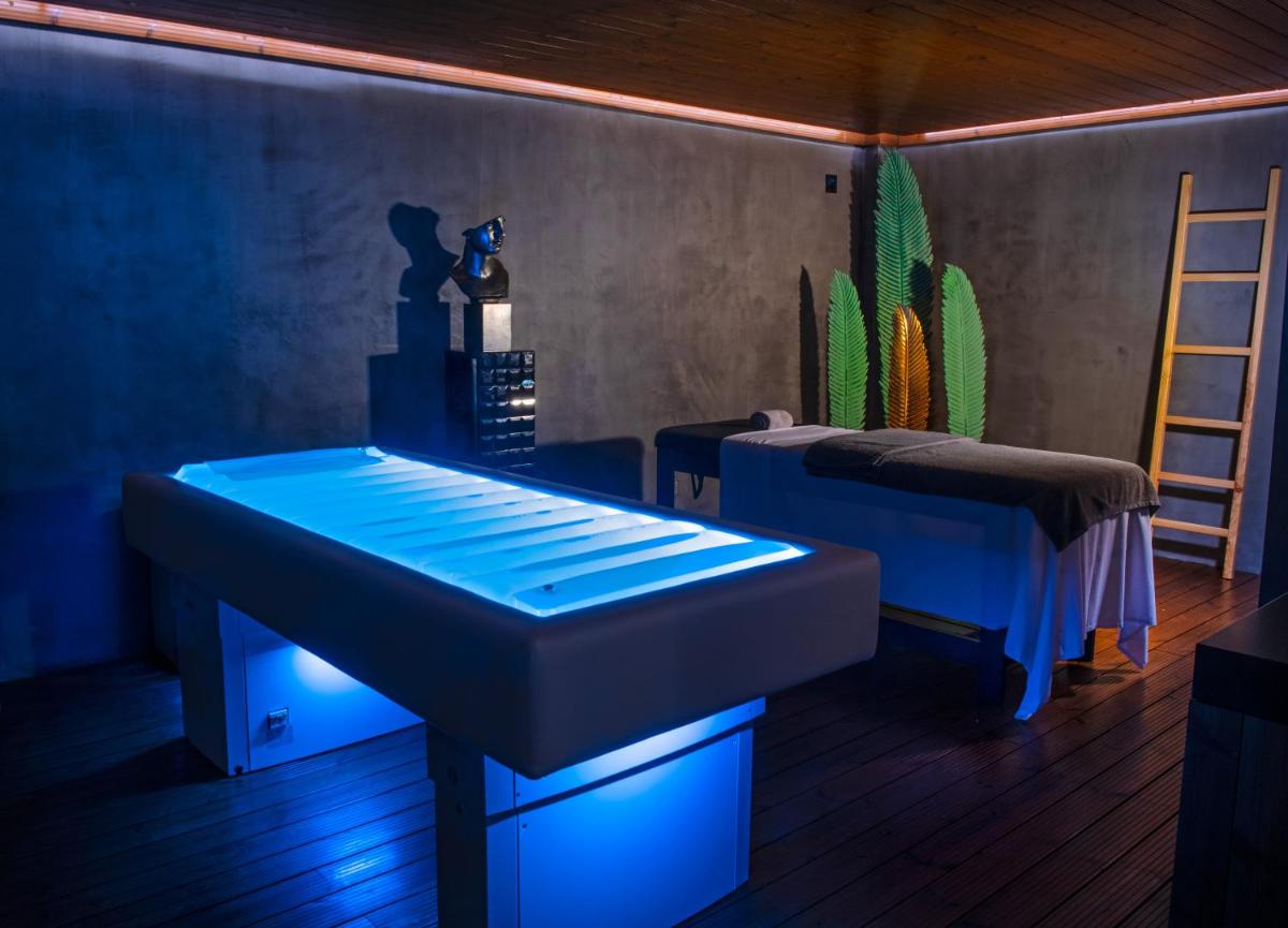 Uma cama ou camas num quarto em Hotel Cristal Vieira Praia & SPA