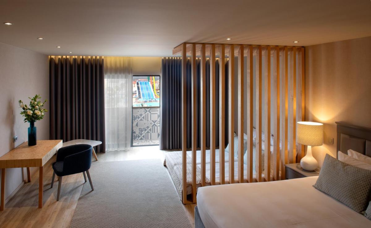 Uma cama ou camas num quarto em Hotel Cristal Vieira Praia & SPA