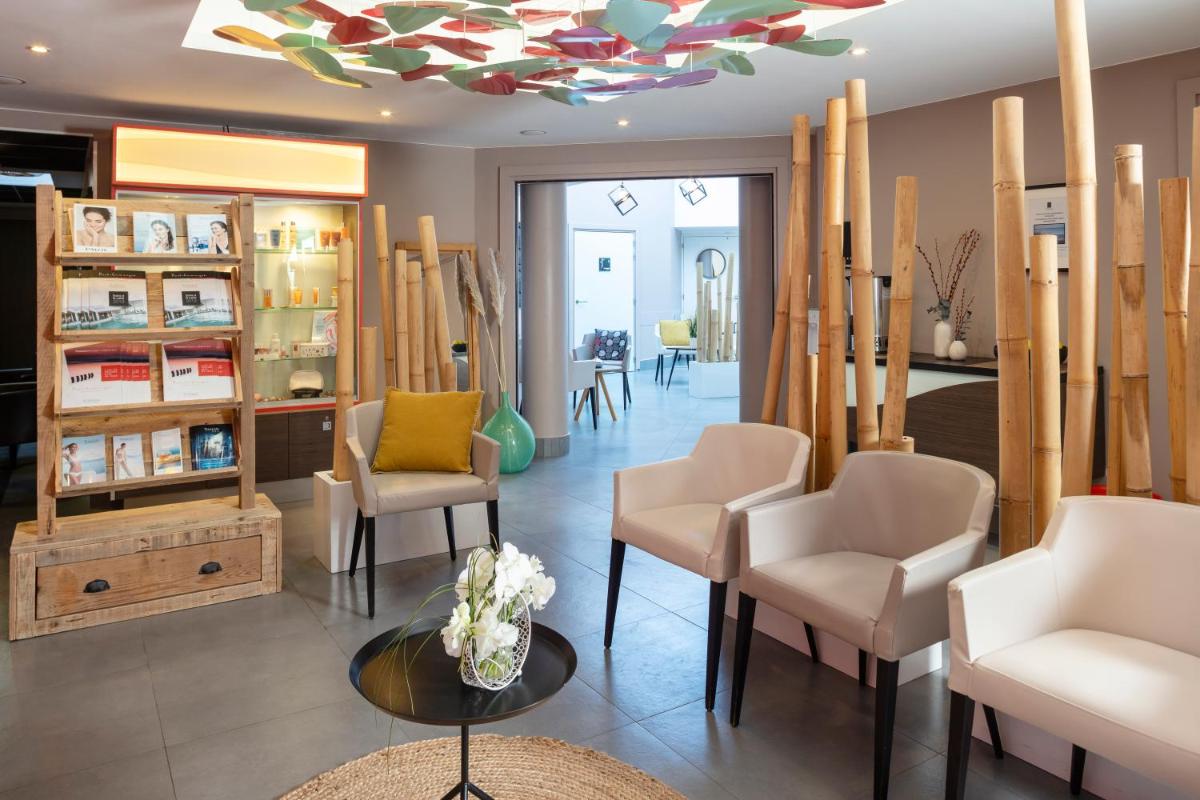 Coin salon dans l'établissement Thalazur Port-Camargue - Hotel & Spa