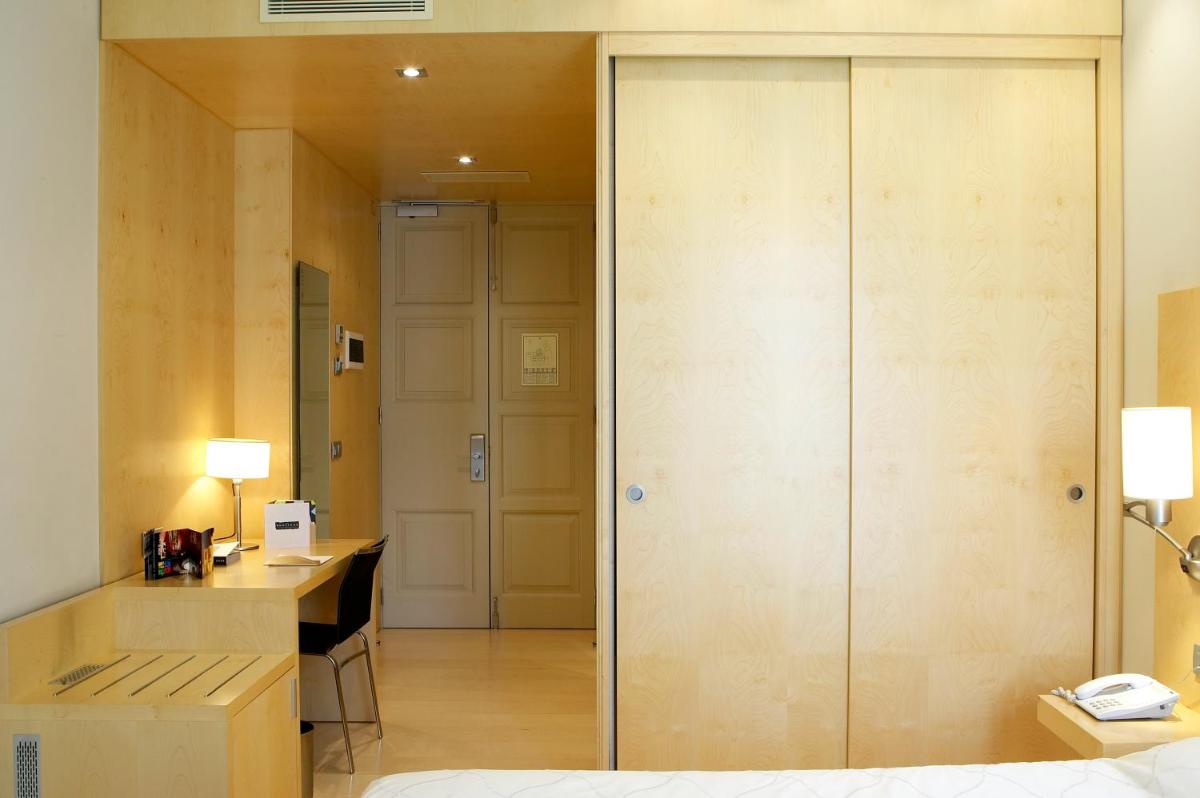 Cama o camas de una habitación en Hotel Sant Roc