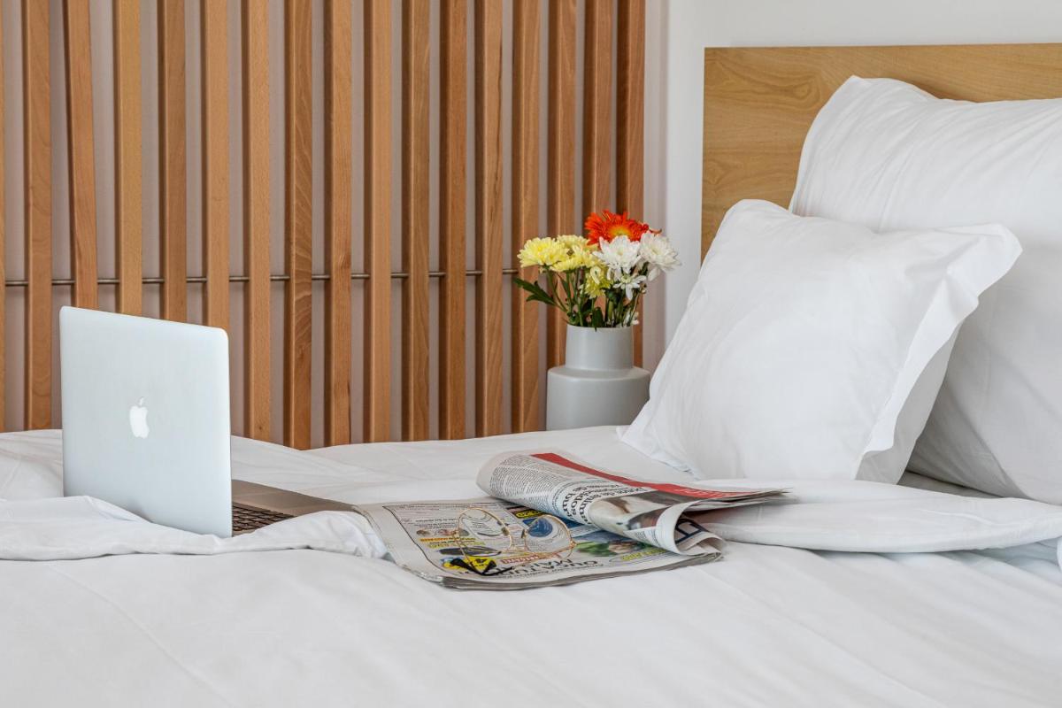 Uma cama ou camas num quarto em Algarve Race Resort - Hotel