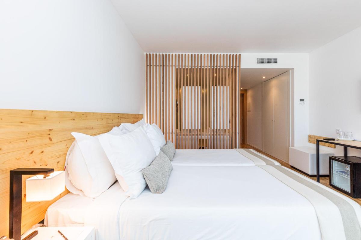 Uma cama ou camas num quarto em Algarve Race Resort - Hotel