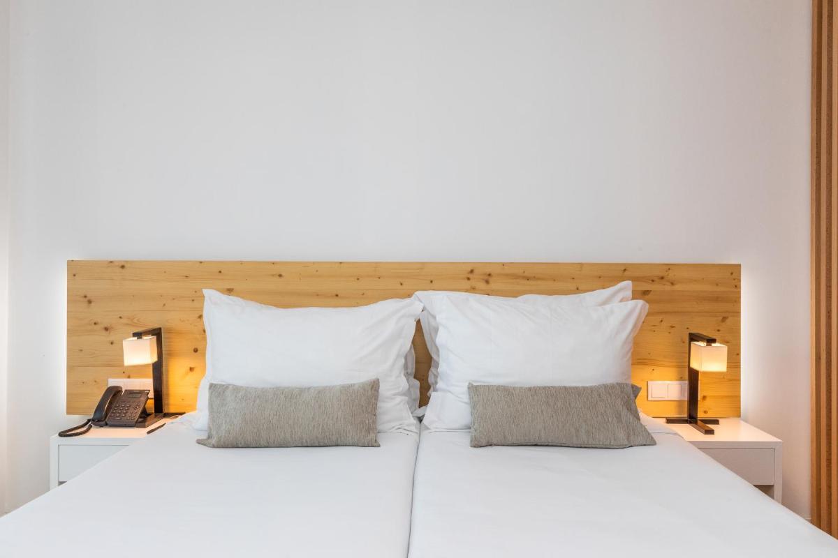 Uma cama ou camas num quarto em Algarve Race Resort - Hotel