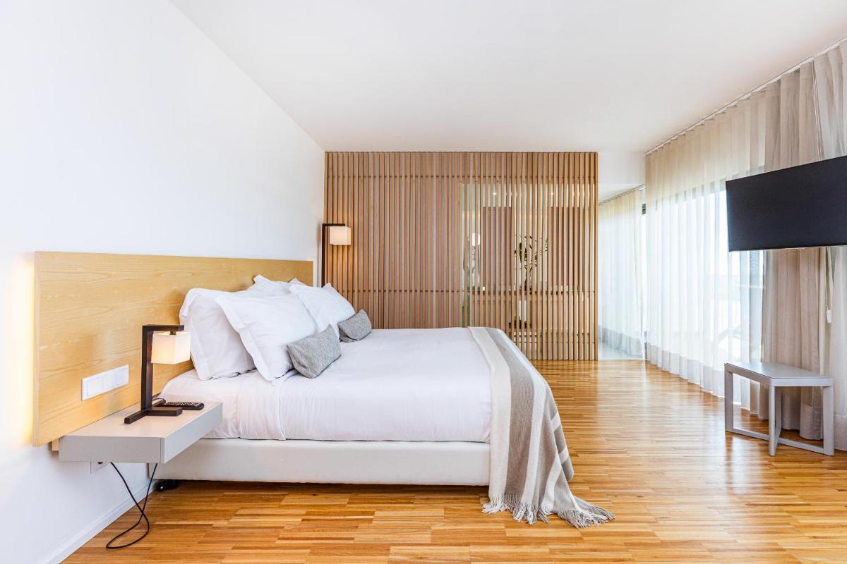 Uma cama ou camas num quarto em Algarve Race Resort - Hotel