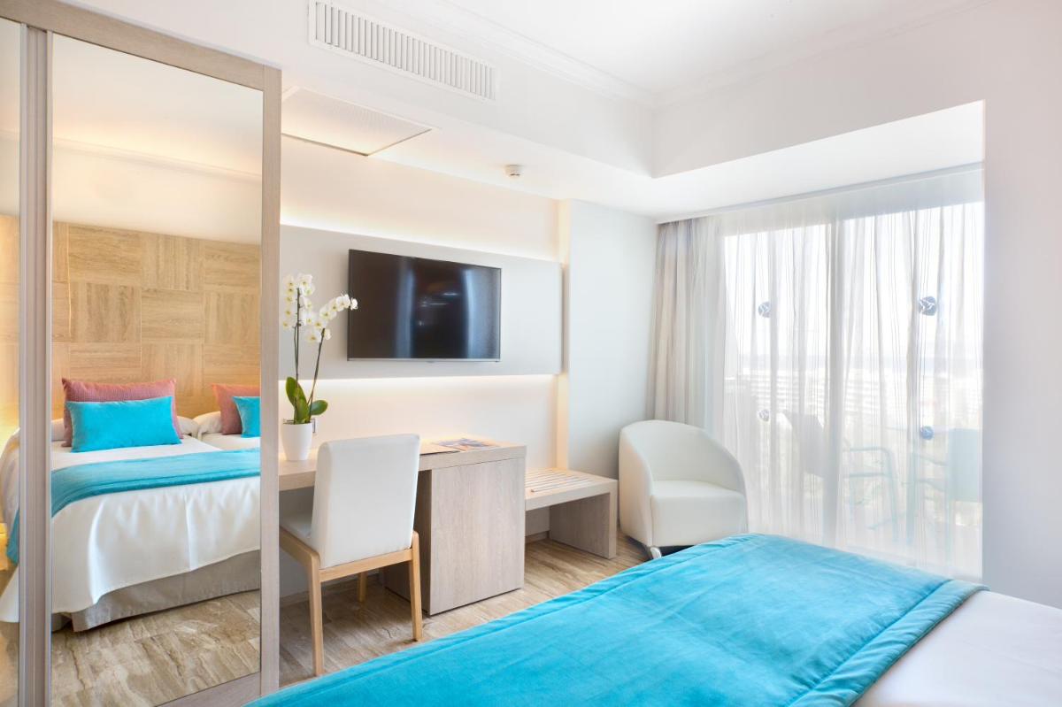 Cama o camas de una habitación en Grupotel Orient