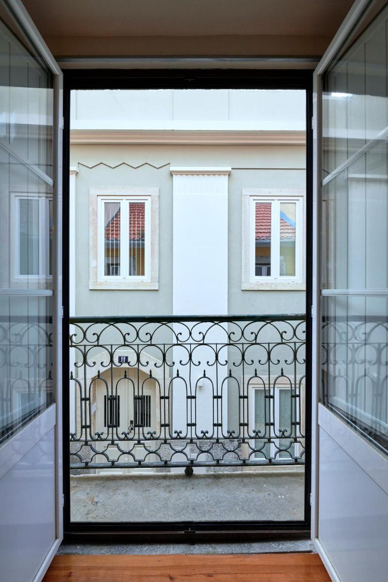 Renovated and Spacious Duplex Apartment With Patio, By TimeCooler - Housity