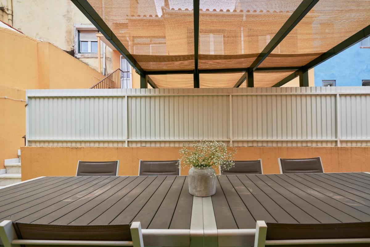 Renovated and Spacious Duplex Apartment With Patio, By TimeCooler - Housity