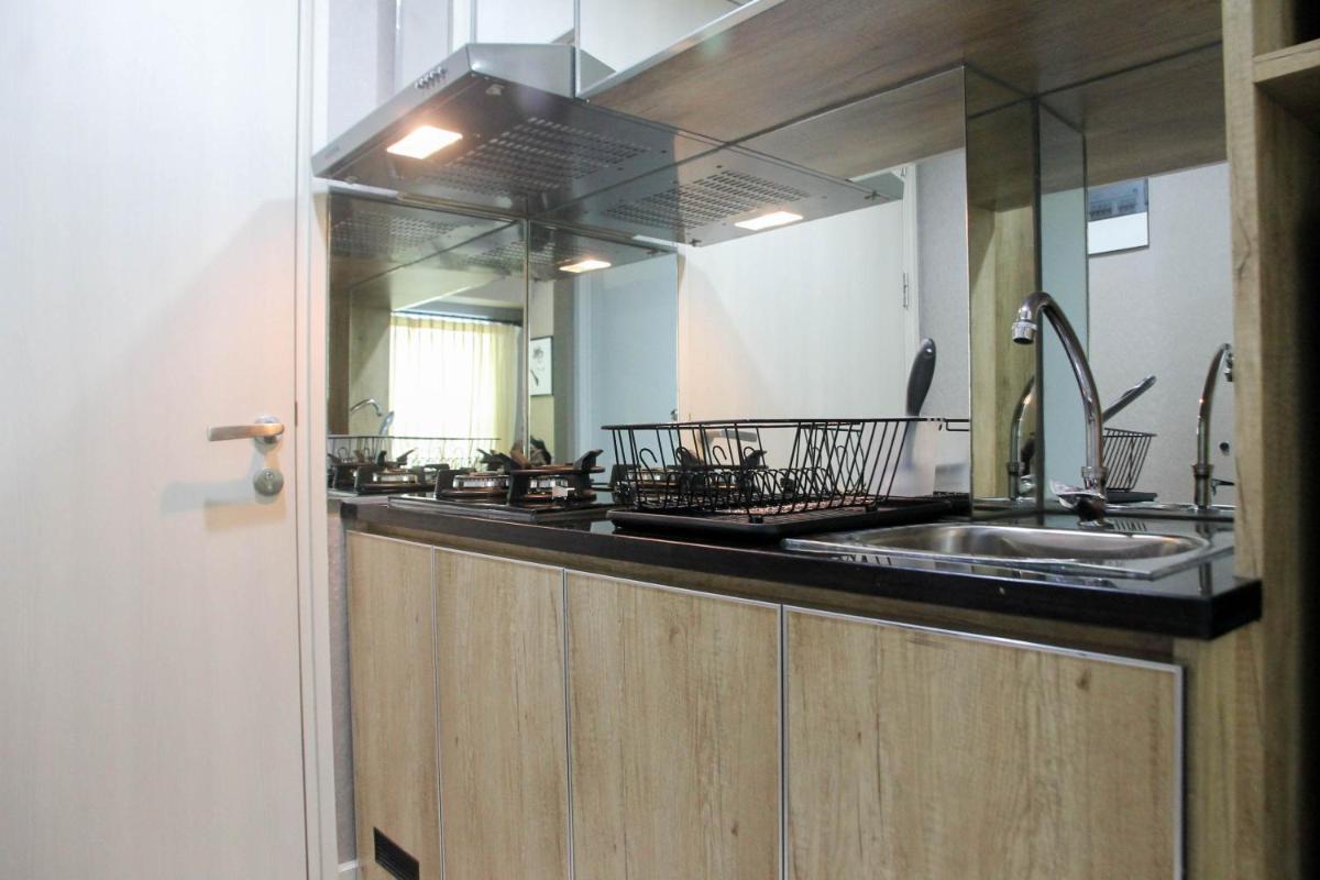 Homey Studio Apartment at Springlake Summarecon Bekasi By Travelio - Housity