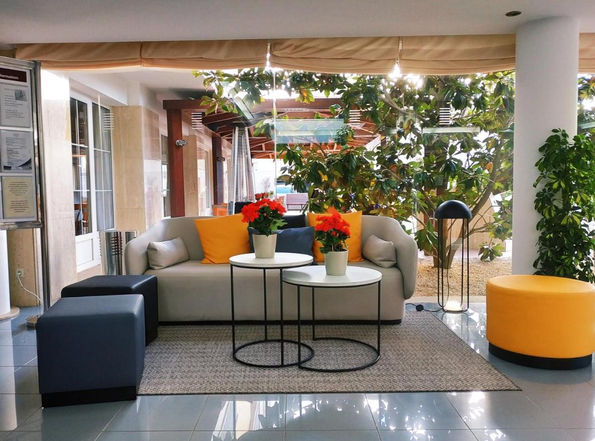 Zona de estar de Hotel Capricho