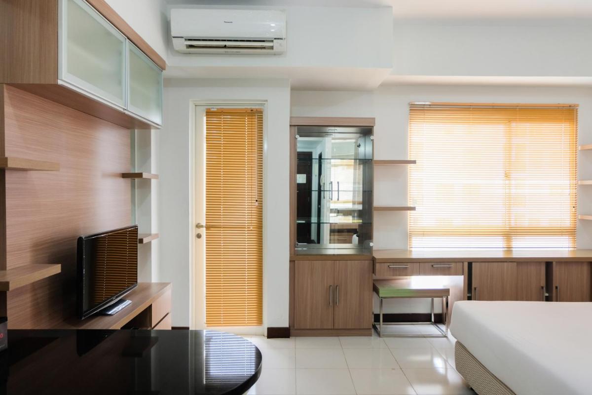 Simply Furnished Studio Apartment at Scientia Residence By Travelio - Housity