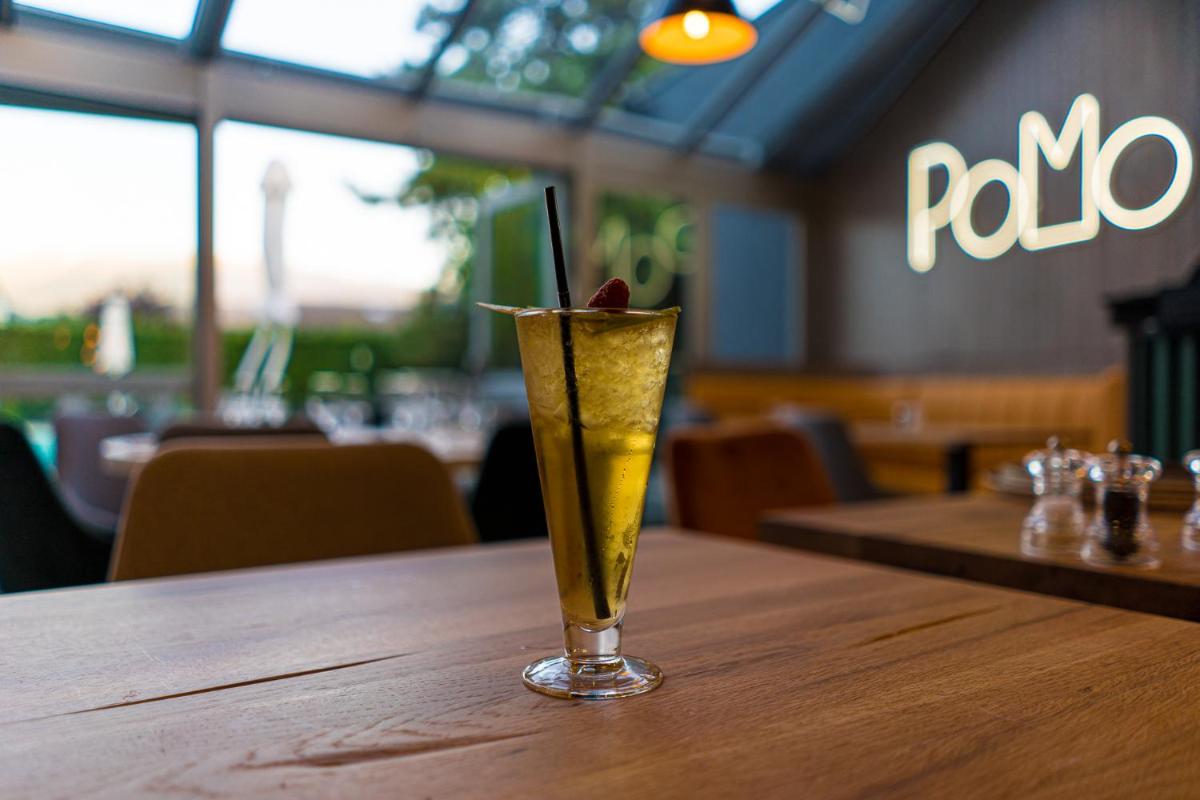 Boissons dans l'établissement PoMo Hôtel & Restaurant