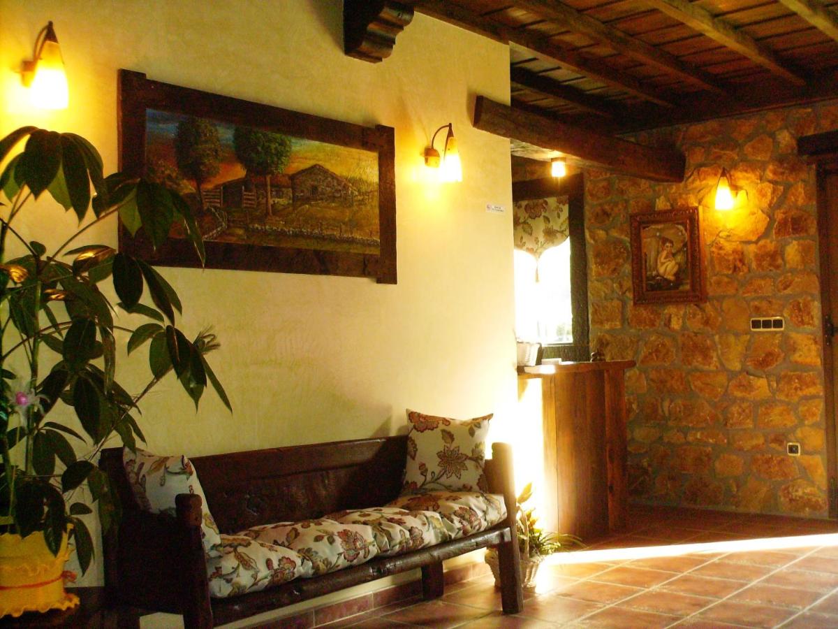 Zona de estar de Hotel Rural El Fundil