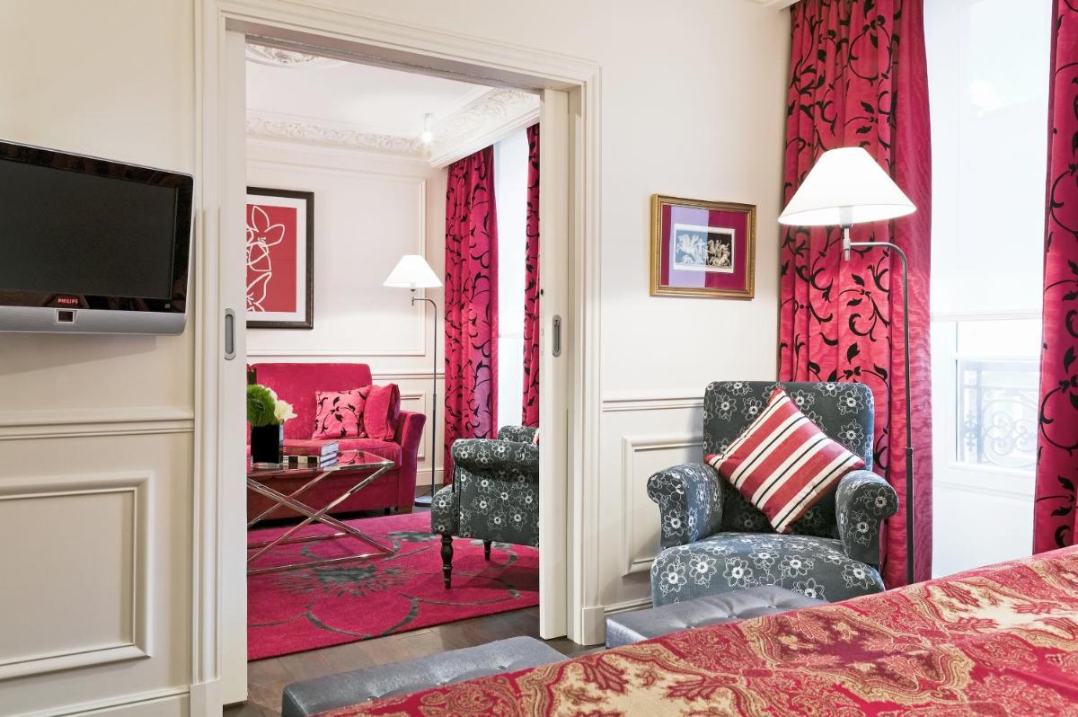 Télévision ou salle de divertissement dans l'établissement Hôtel Keppler