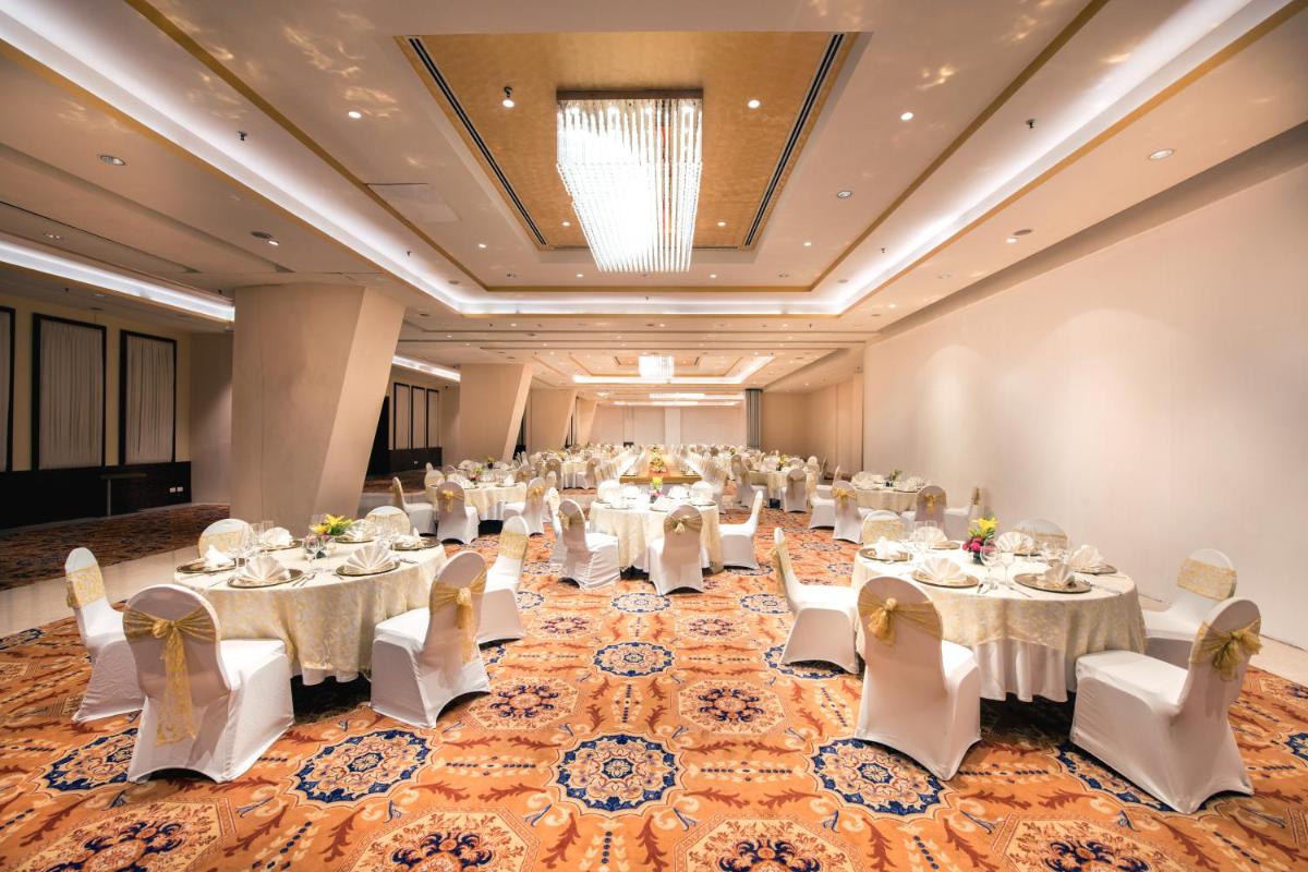 a large banquet hall with white tables and chairs at Welcomhotel by ITC Hotels, Dwarka, New Delhi in New Delhi +41 photos a large banquet hall with white tables and chairs at Welcomhotel by ITC Hotels, Dwarka, New Delhi in New Delhi +41 photos