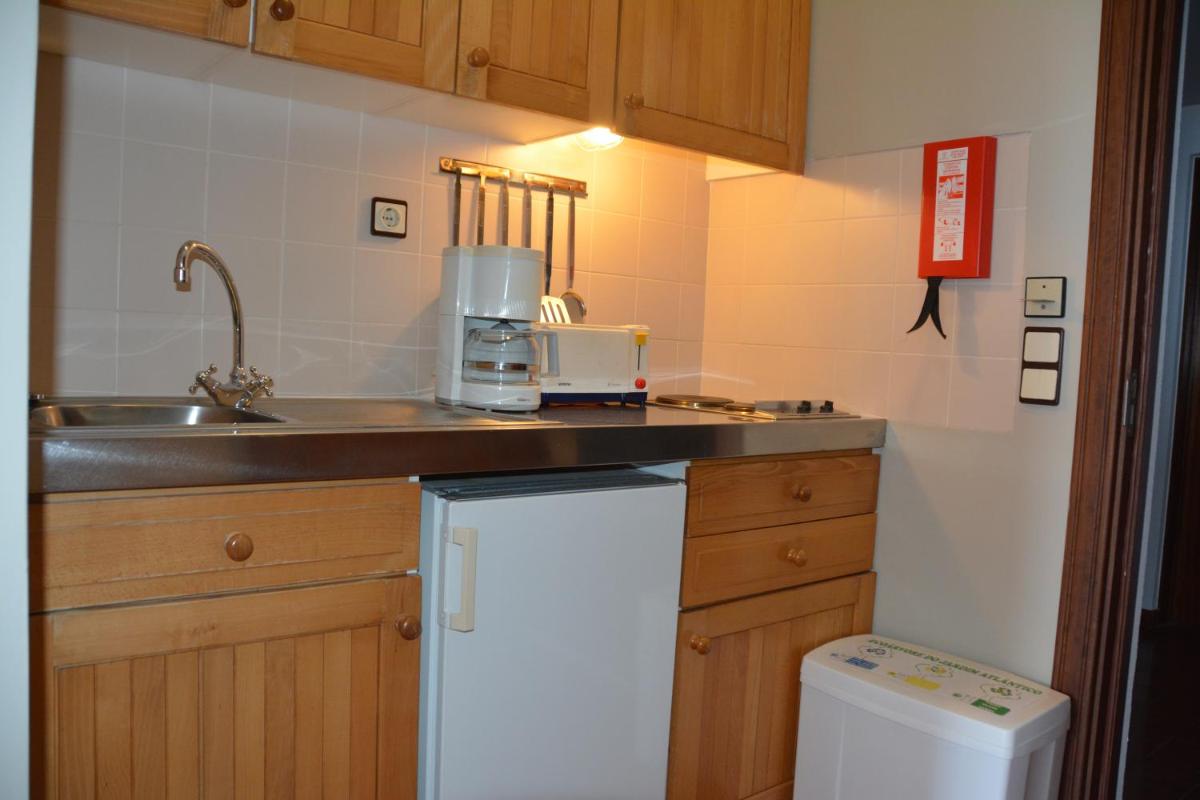 A cozinha ou kitchenette de Hotel Jardim Atlantico