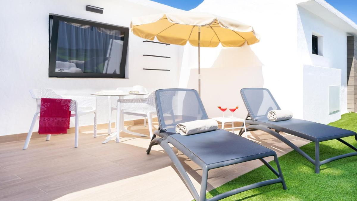 Un patio o zona al aire libre en Club Maspalomas Suites & Spa - Adults Only
