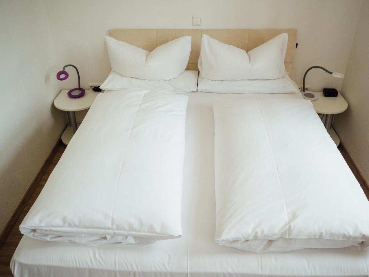 Hotel Garni Ammergauer Hof - Housity