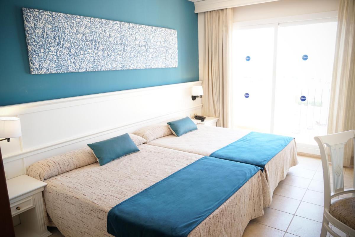 Cama o camas de una habitación en Ohtels Cabogata