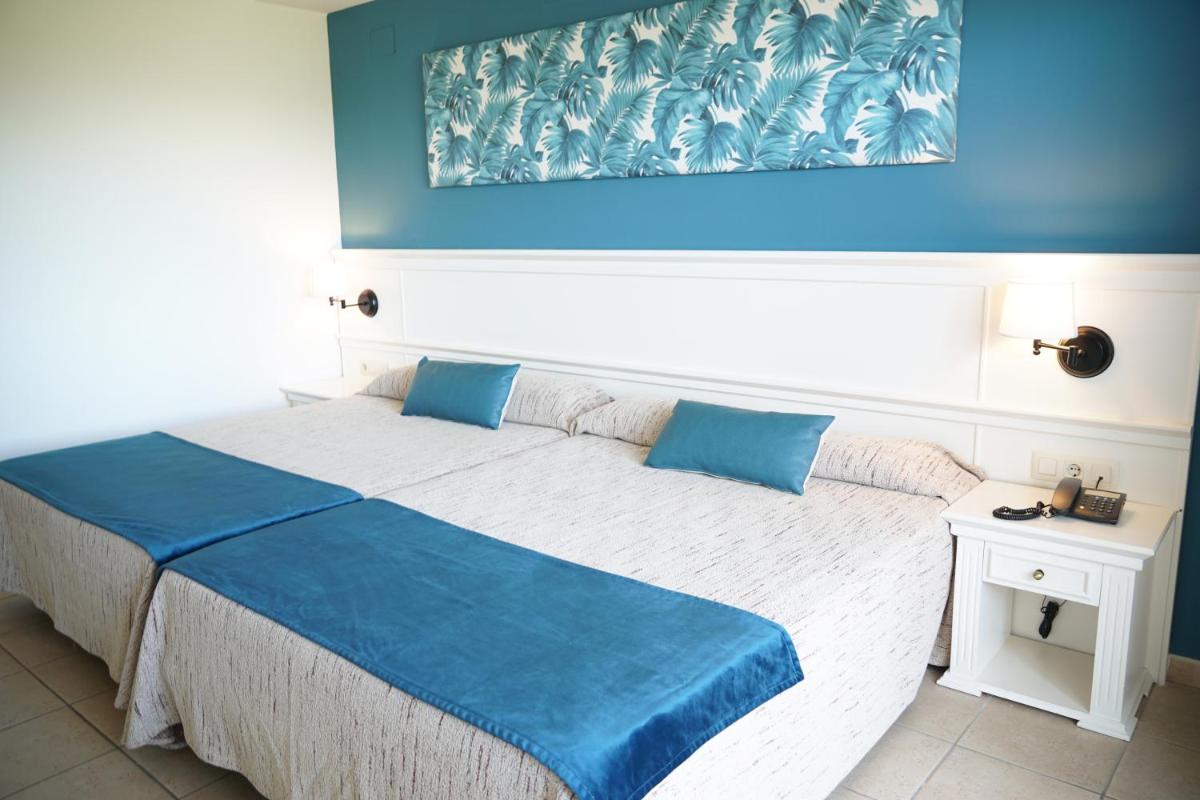 Cama o camas de una habitación en Ohtels Cabogata