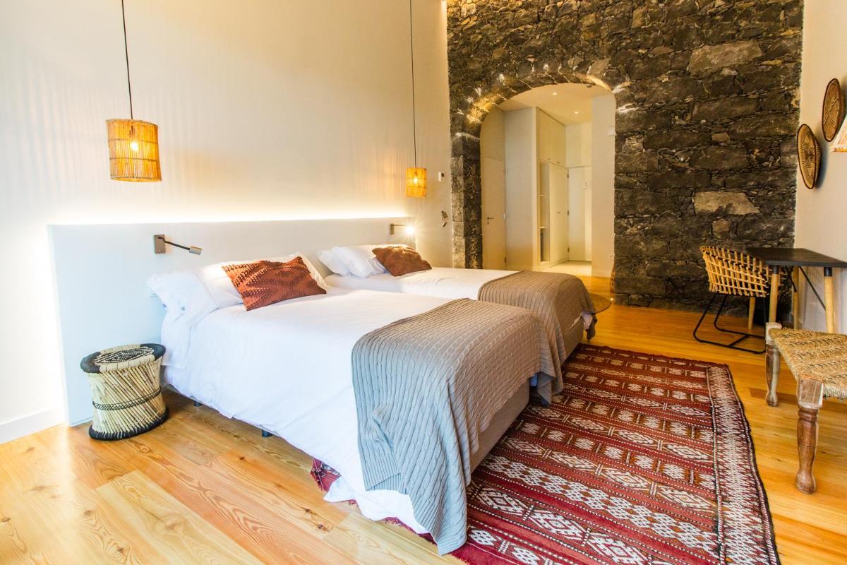 Uma cama ou camas num quarto em SENSI Azores Nature and SPA