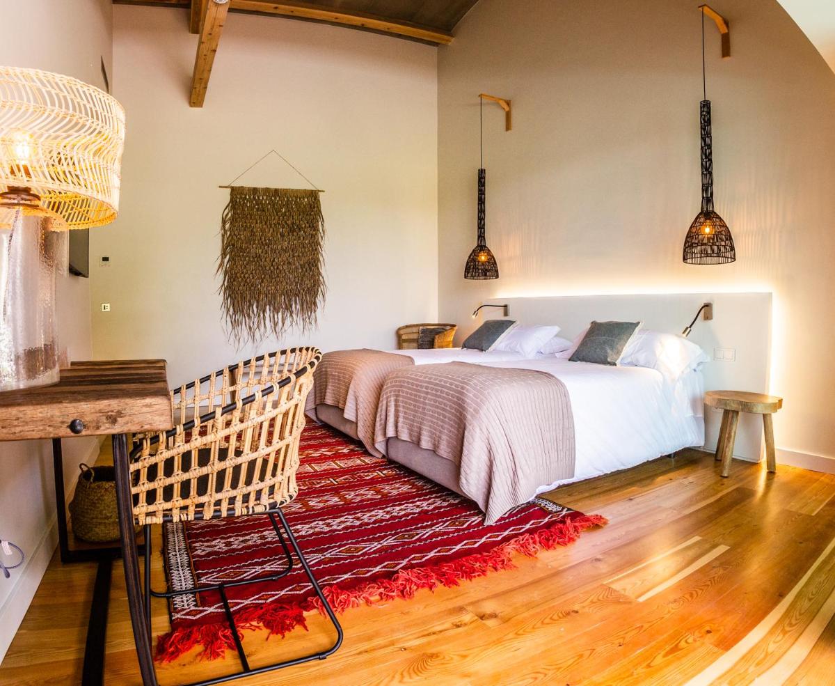 Uma cama ou camas num quarto em SENSI Azores Nature and SPA