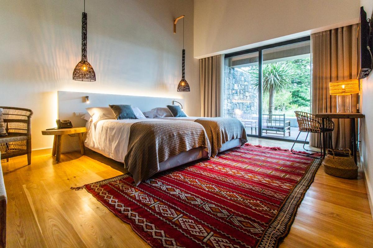Uma cama ou camas num quarto em SENSI Azores Nature and SPA