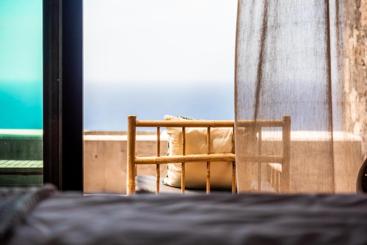 Uma cama ou camas num quarto em SENSI Azores Nature and SPA