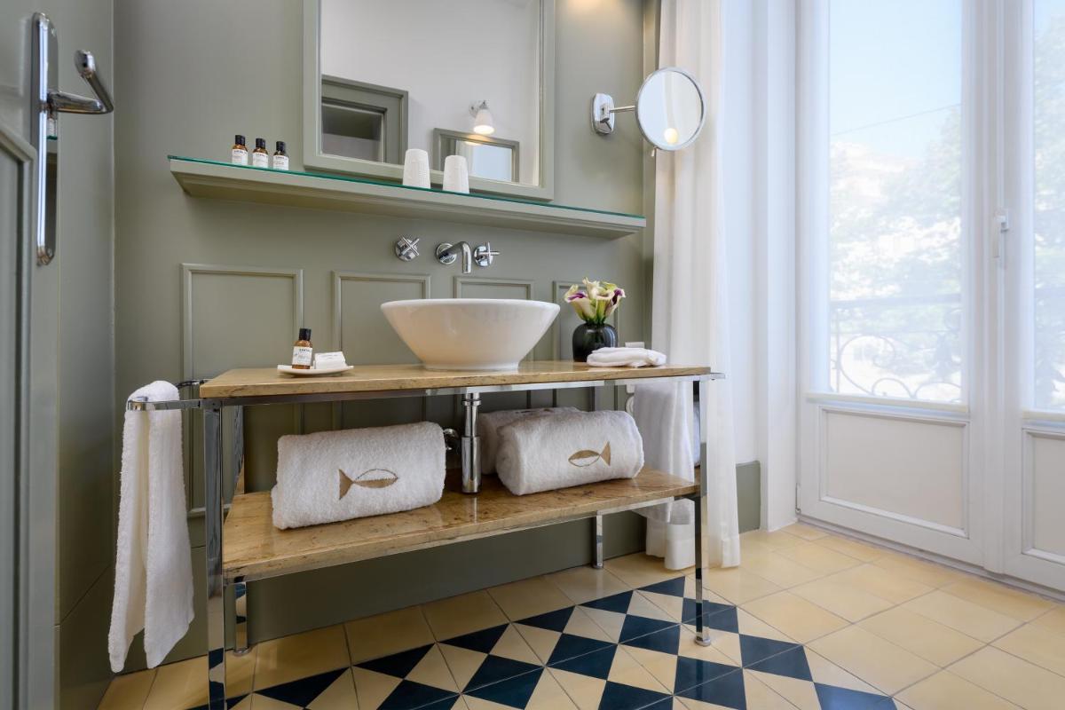 A cozinha ou kitchenette de Bairro Alto Hotel