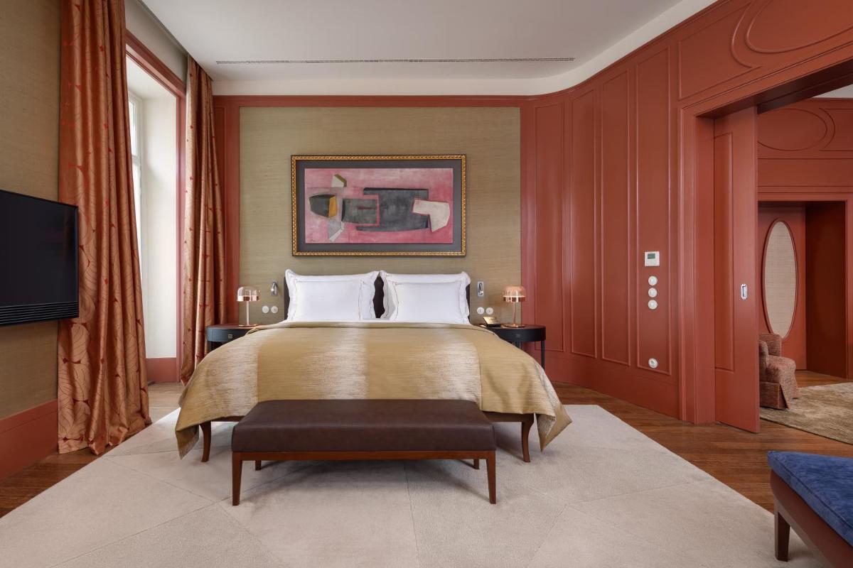 Uma cama ou camas num quarto em Bairro Alto Hotel