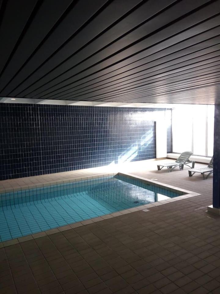 Appartement 2 pieces 40 m2, dans hyper centre, avec piscine au rez de chaussee - Hizvo